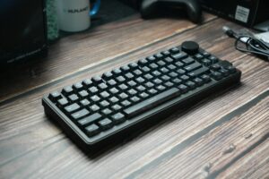 Close-up view of a mechanical keyboard showing individual switches and keycaps ready for customization