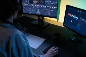 How to Set Up Adobe Premiere Pro with AI Auto-Edit Features Professional video editing workstation with multiple monitors showing Premiere Pro interface