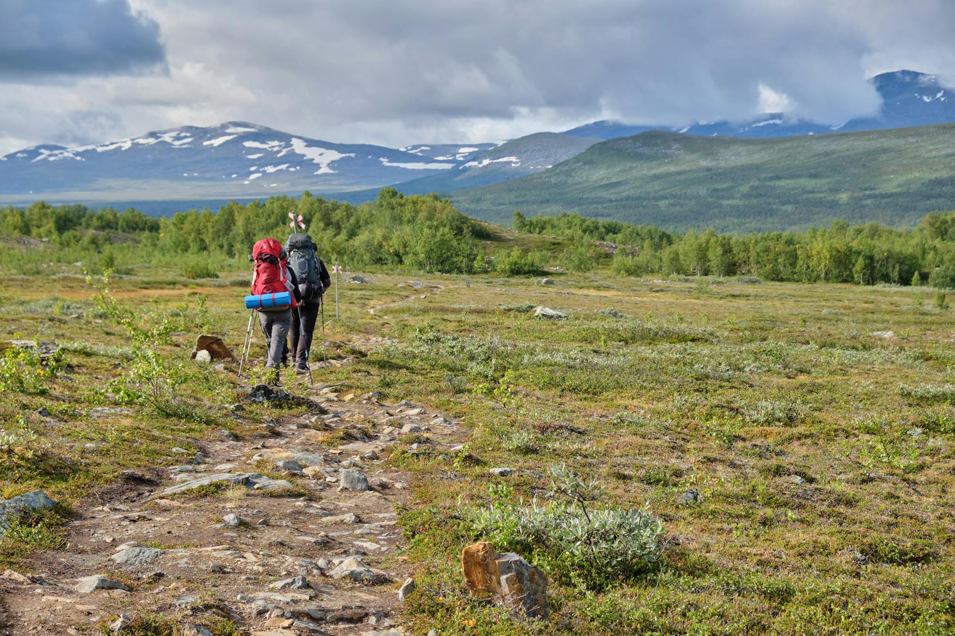 Mountain hiking trail with rocky terrain and scenic outdoor landscape view