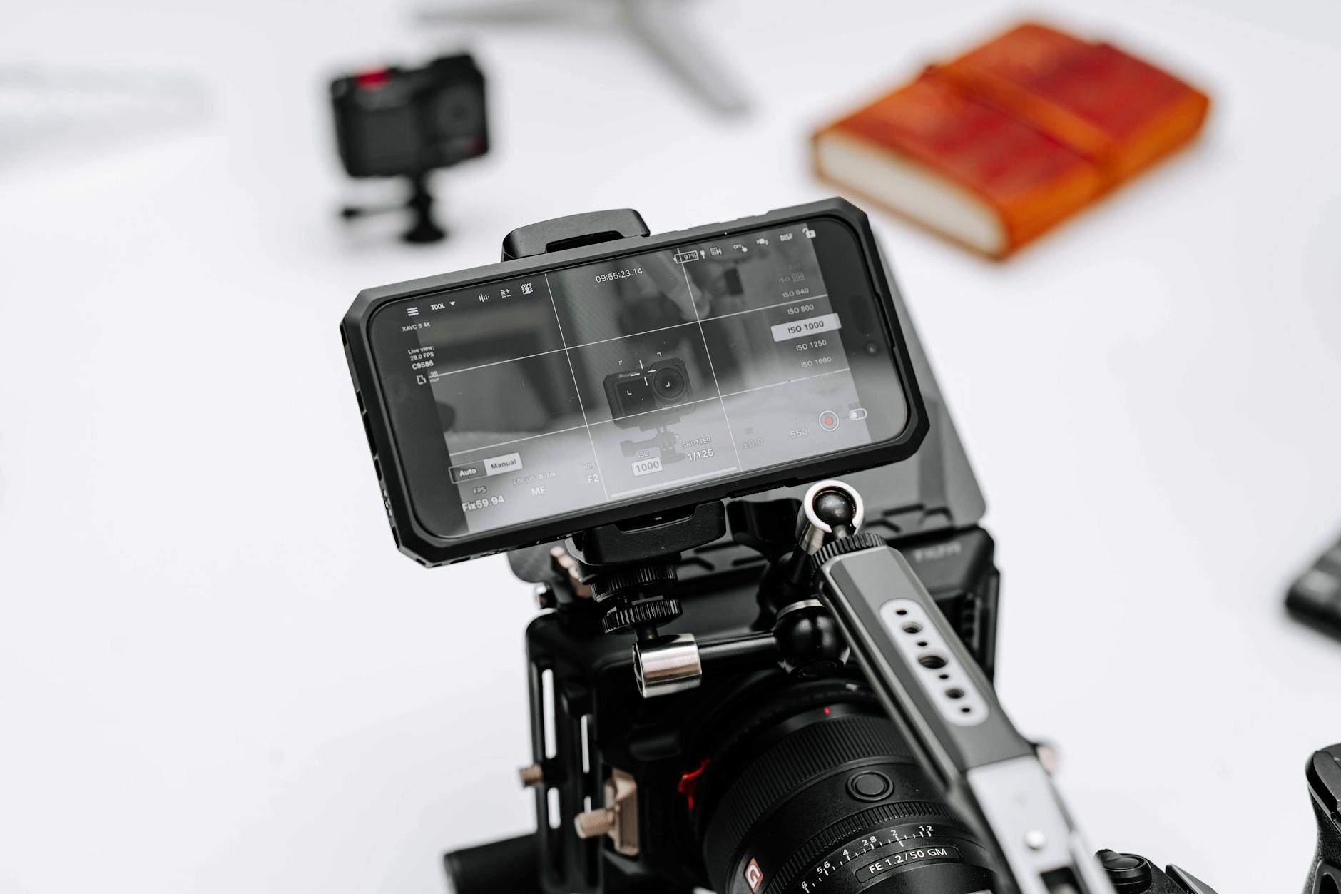 Professional video camera mounted on tripod with equipment