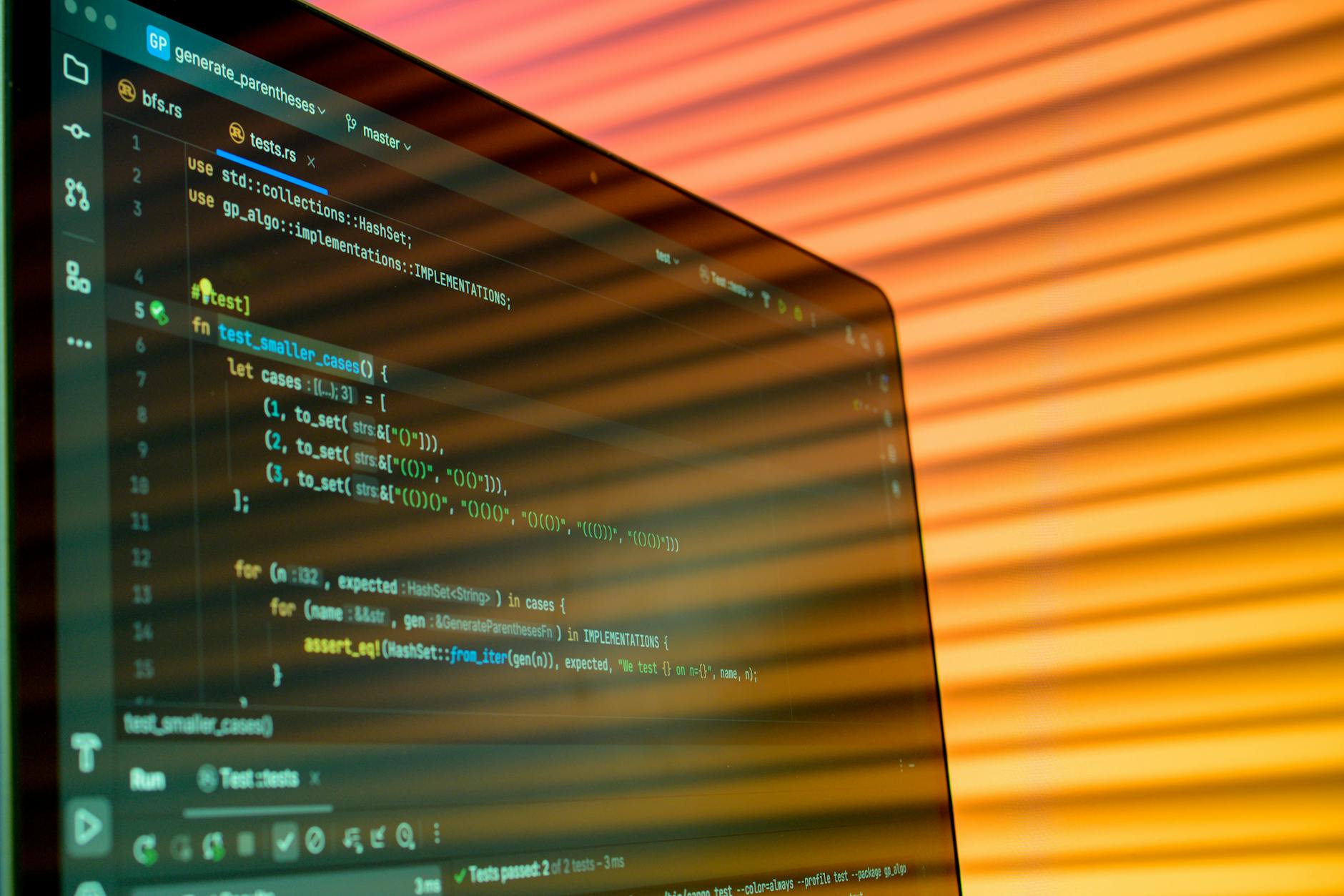 Developer working on computer screen showing code and terminal commands for Kubernetes deployment