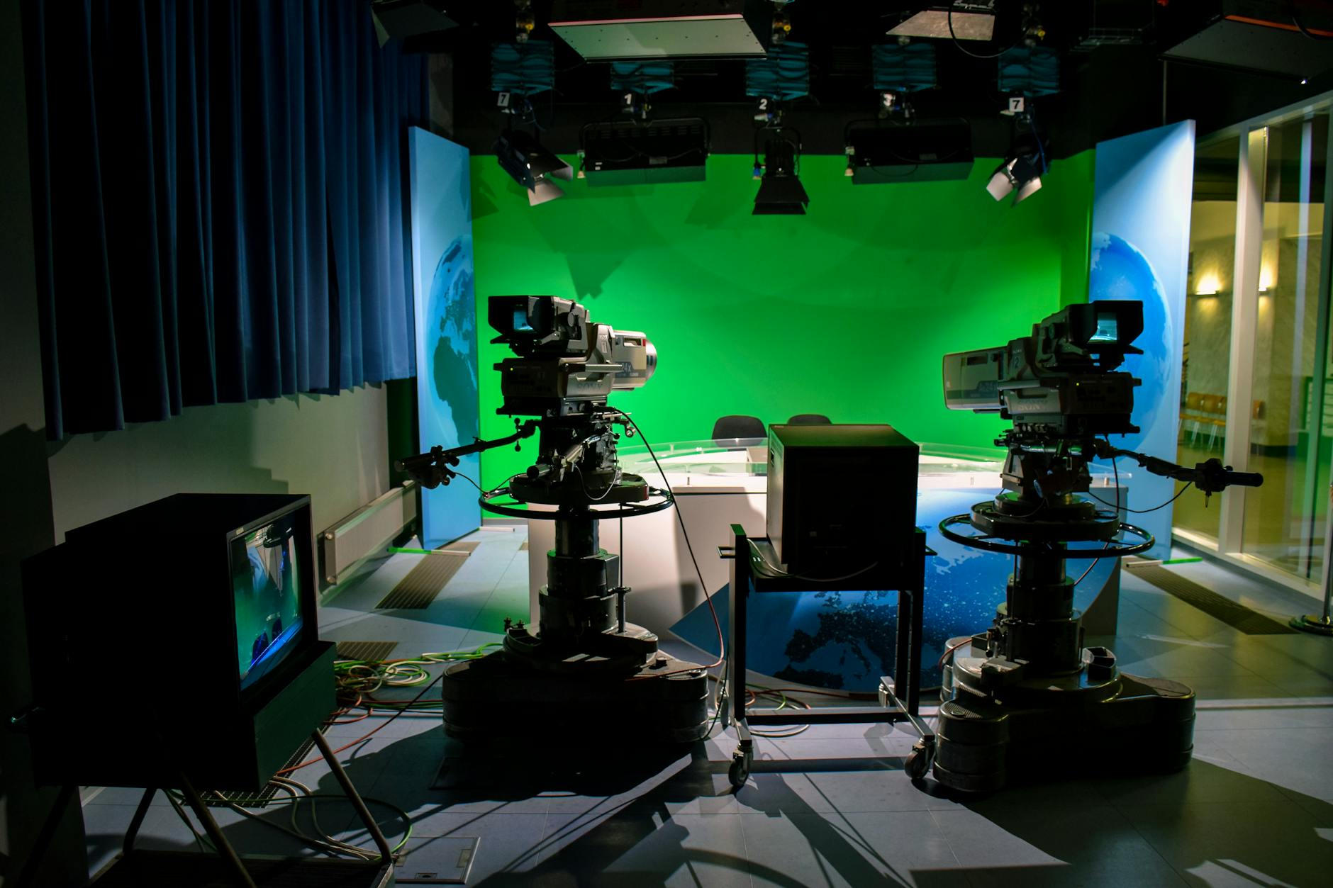 Professional video recording studio with lighting equipment and camera setup