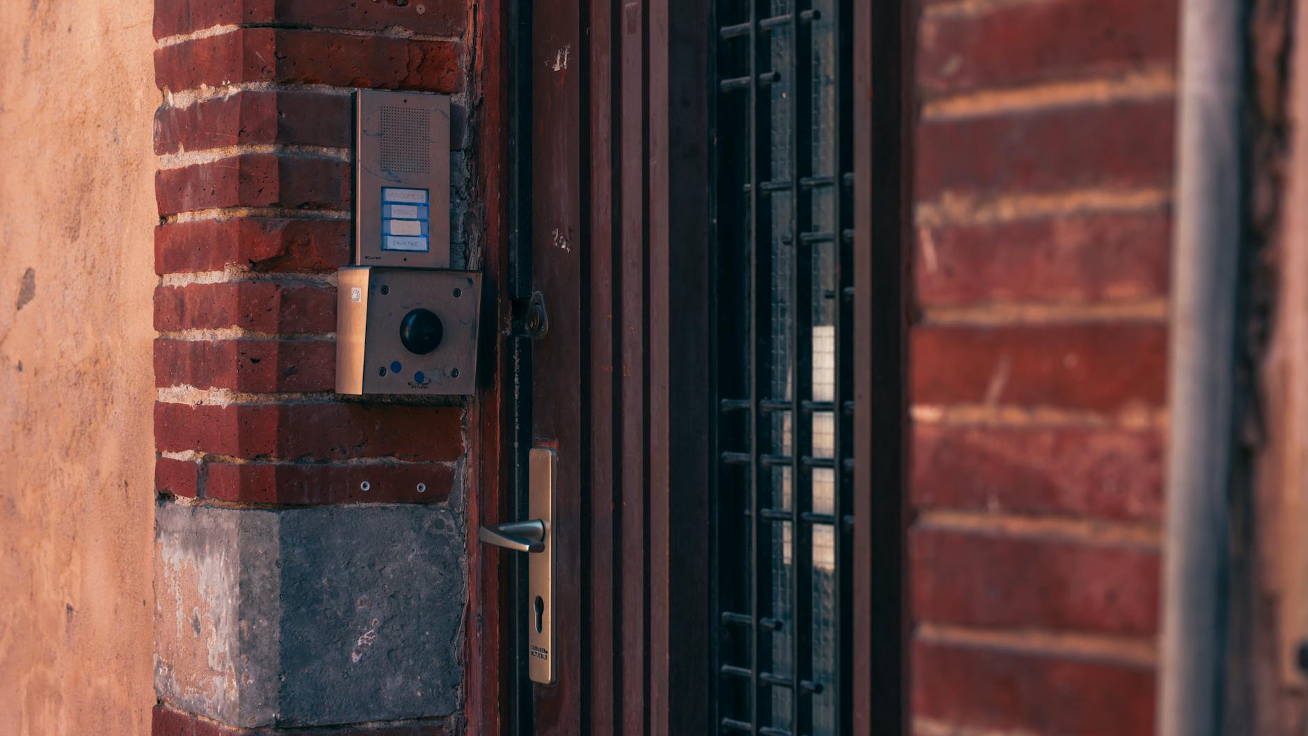 Smart home security system control panel displaying camera feeds and monitoring options
