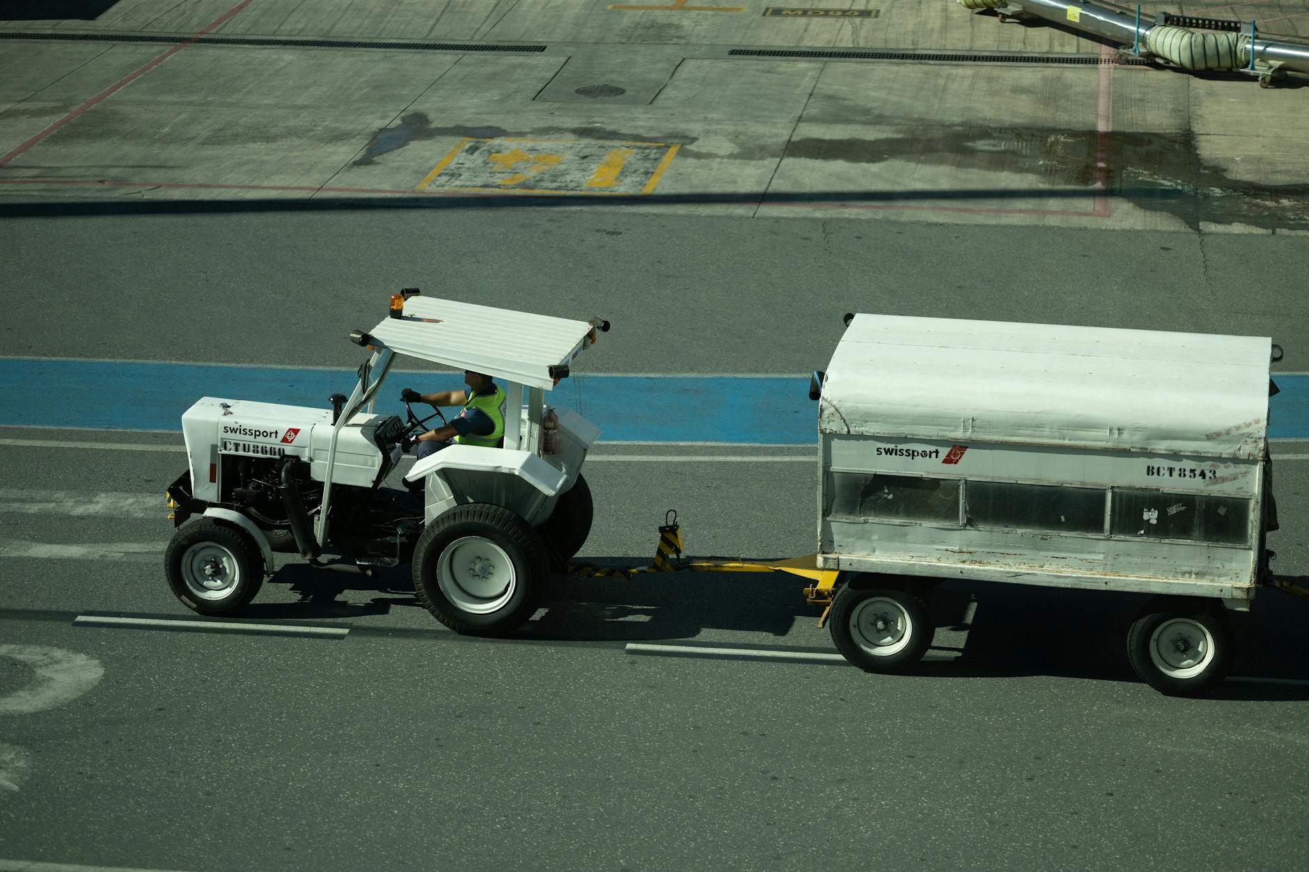 Travelers with luggage at busy airport terminal showcasing baggage handling challenges