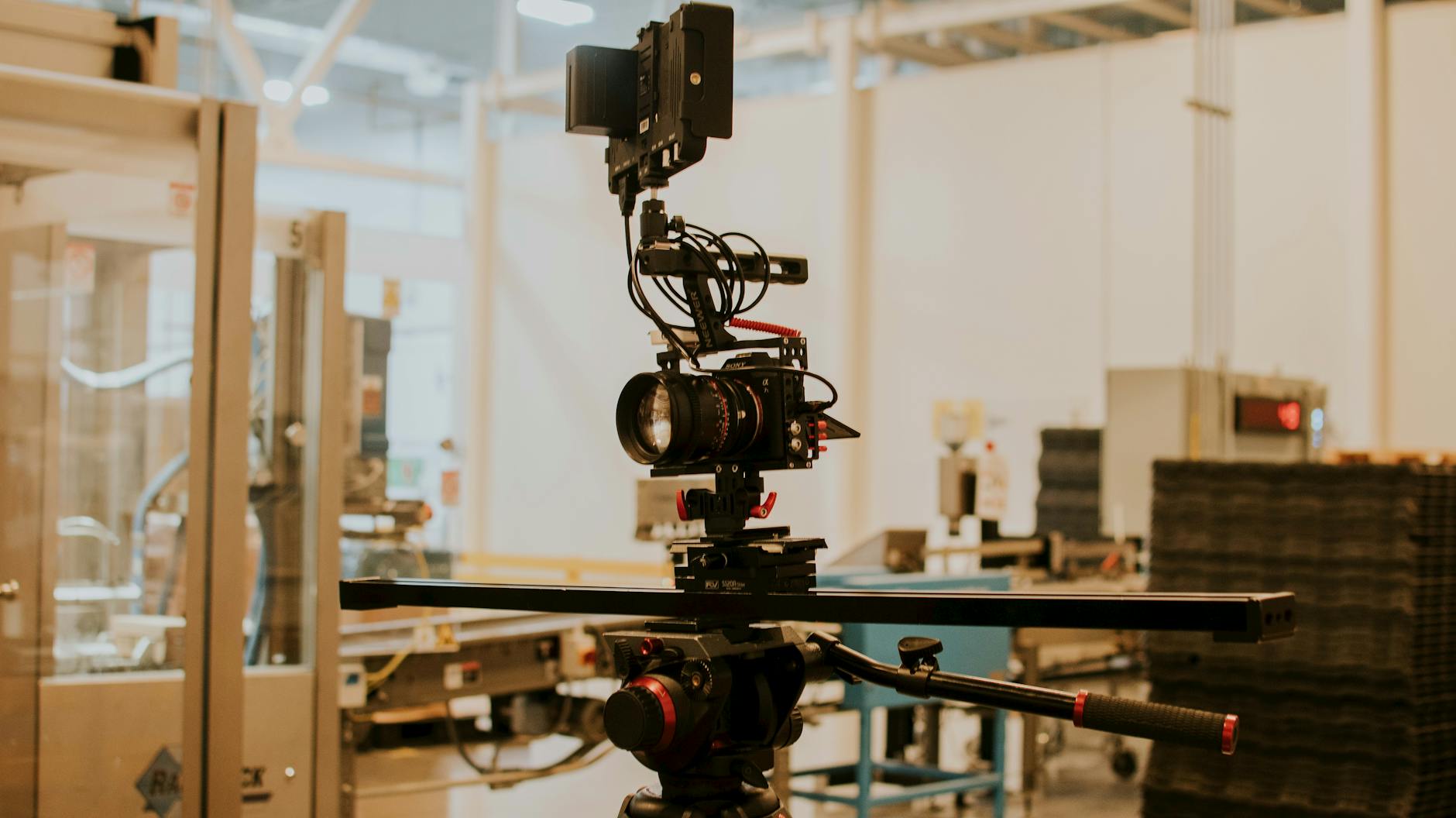 Modern video production workspace with editing equipment and color-accurate monitors