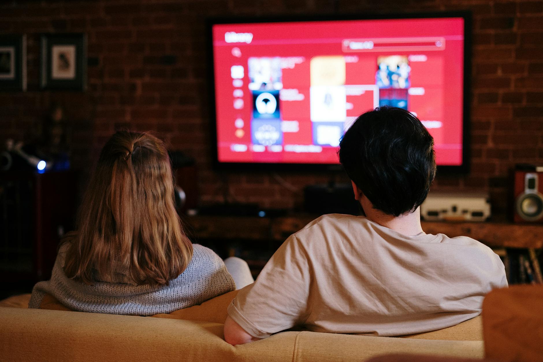Smart TV displaying cloud gaming service interface in modern living room