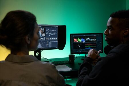 Complete Guide to DaVinci Resolve: Professional Color Grading and Audio Post-Production Professional video editing setup with monitor displaying color grading interface