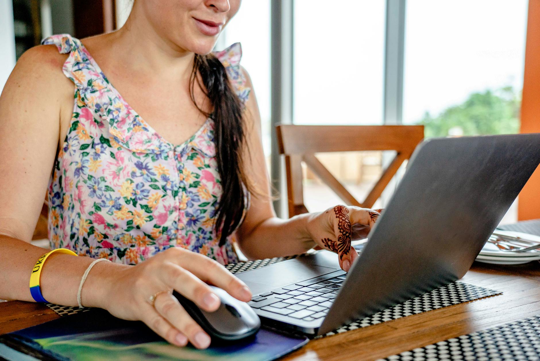 Person working remotely on a laptop with a secure network connection