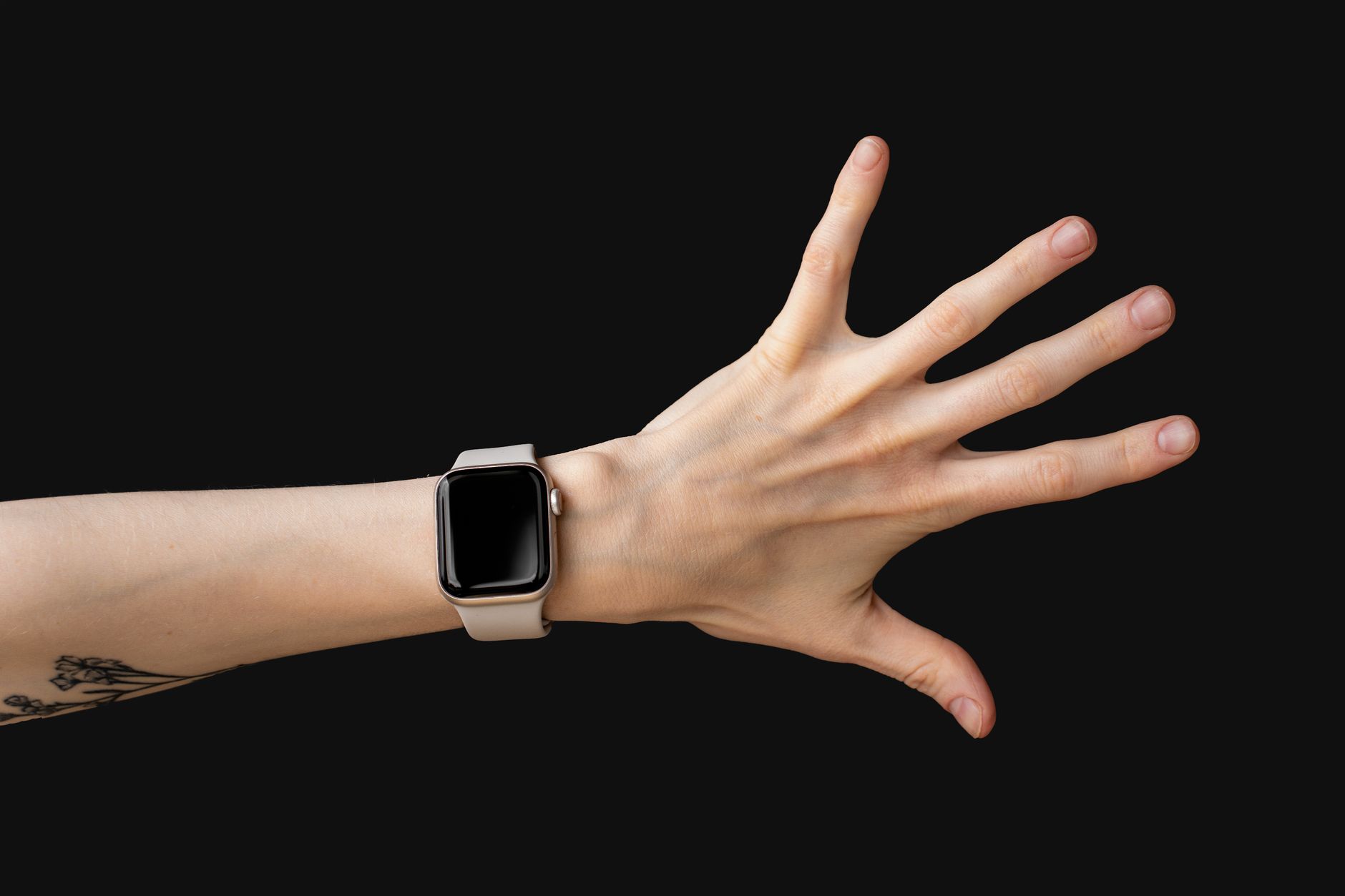Person wearing a health monitoring ring on their hand during daily activity