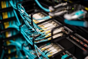Set Up Tailscale for Zero-Config Private Network Access Server rack with network cables representing private network infrastructure