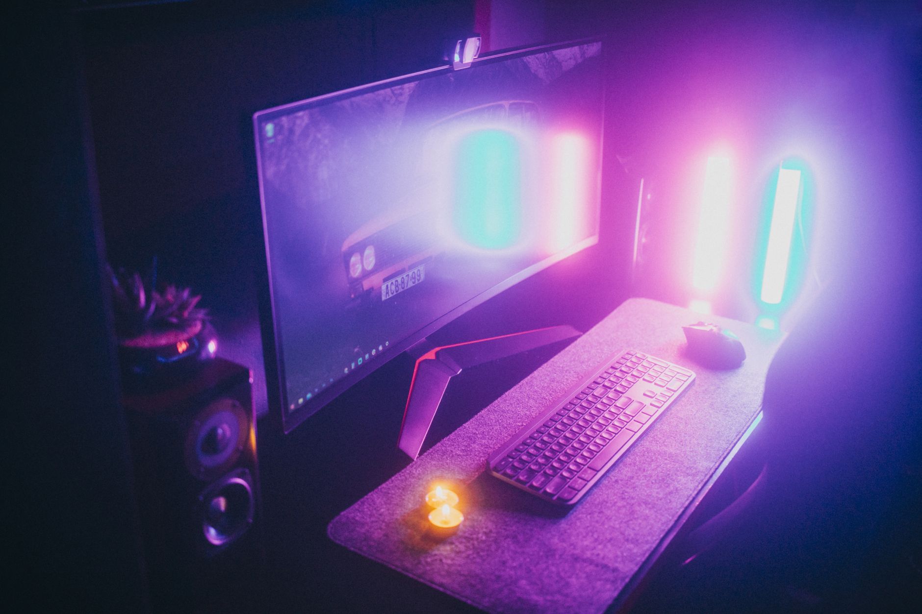 A tidy home tech workspace with a desktop printer and tools on the desk