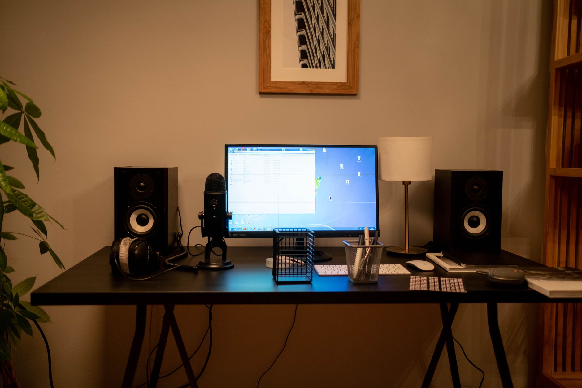 A home office computer setup used for self-hosted server management
