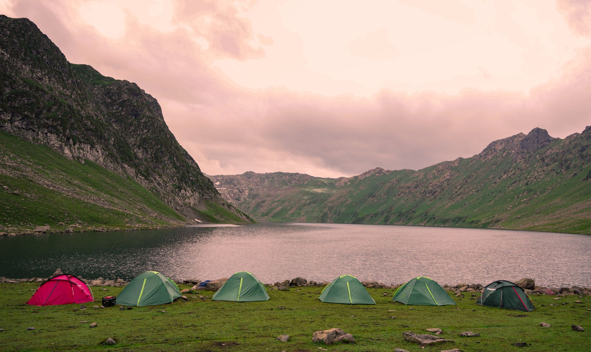 Remote wilderness camping area with no cell coverage, highlighting the need for satellite communicators