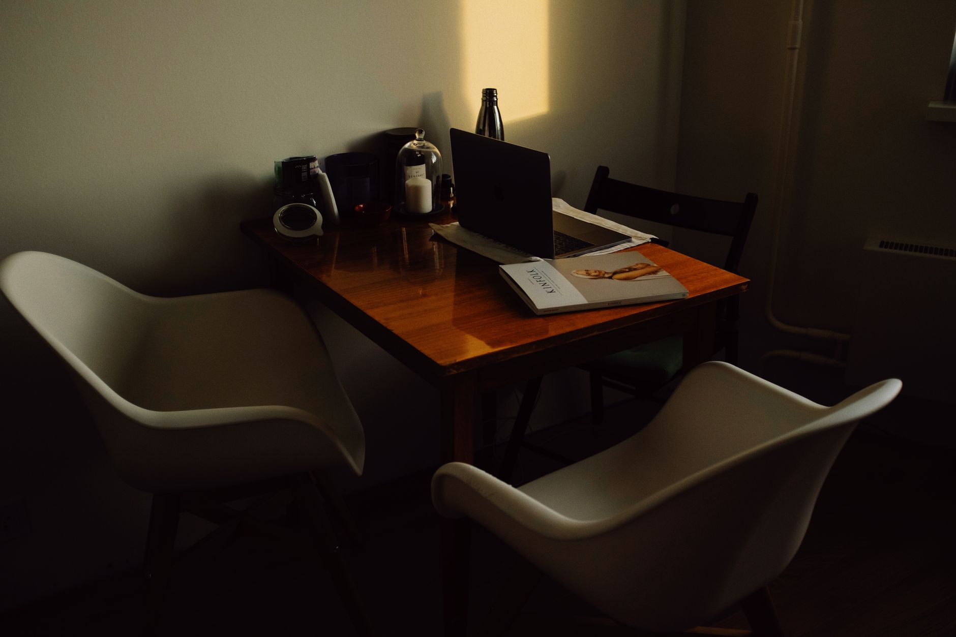 A laptop on a desk showing a local AI chat interface running offline