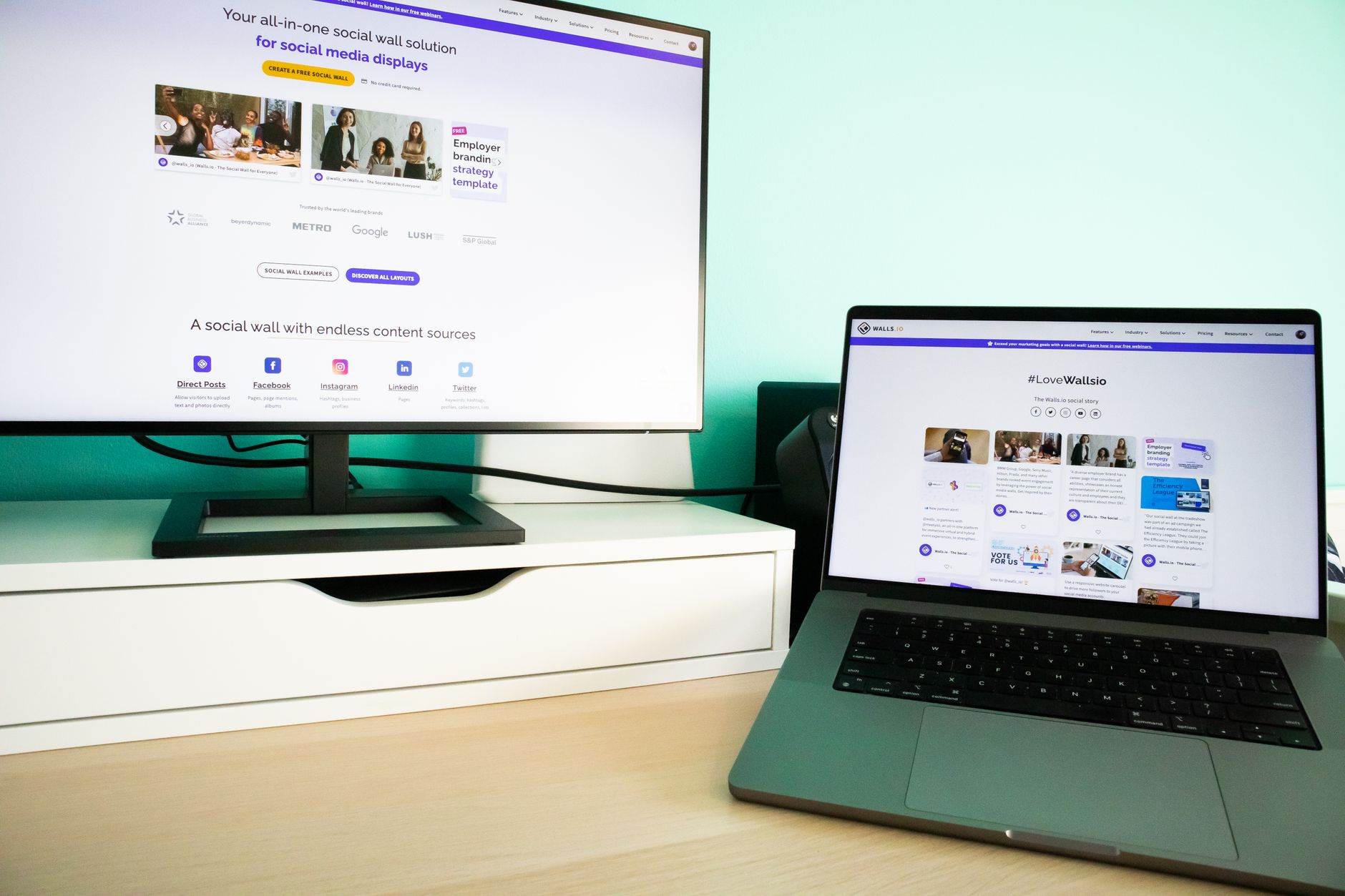 Laptop and desktop computer side by side representing file synchronization between devices