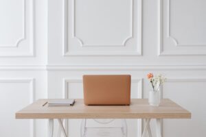 Clean minimal home office desk setup representing a streamlined digital workspace