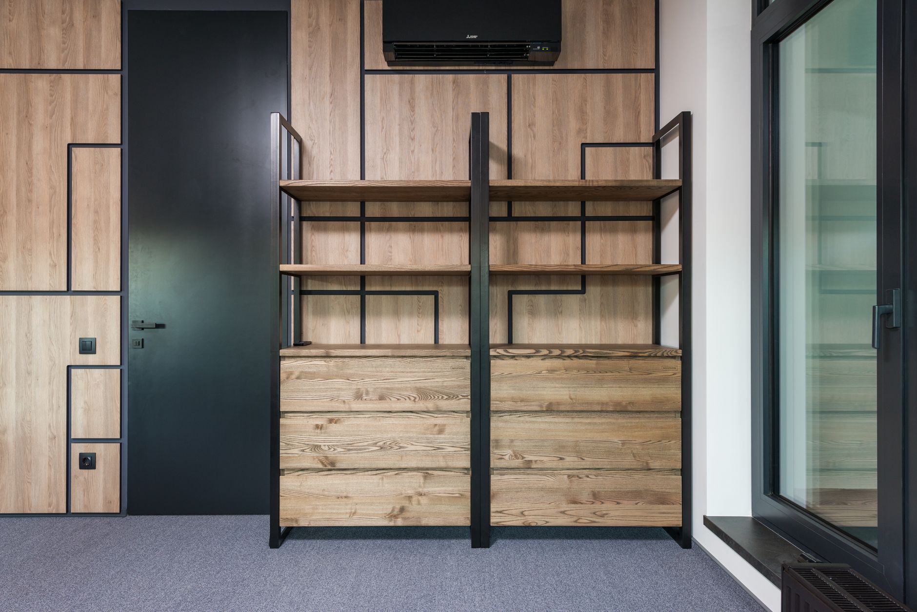Organized shelving unit with labeled boxes representing a home inventory system