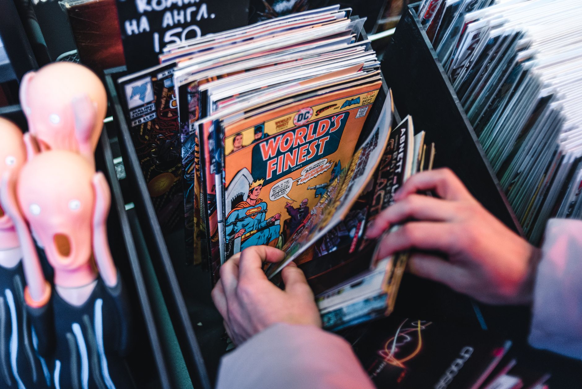 A stack of comic books organized on a shelf