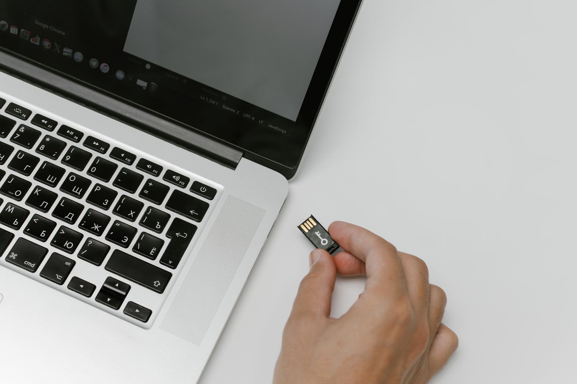 A laptop displaying a file synchronization interface for cloud storage