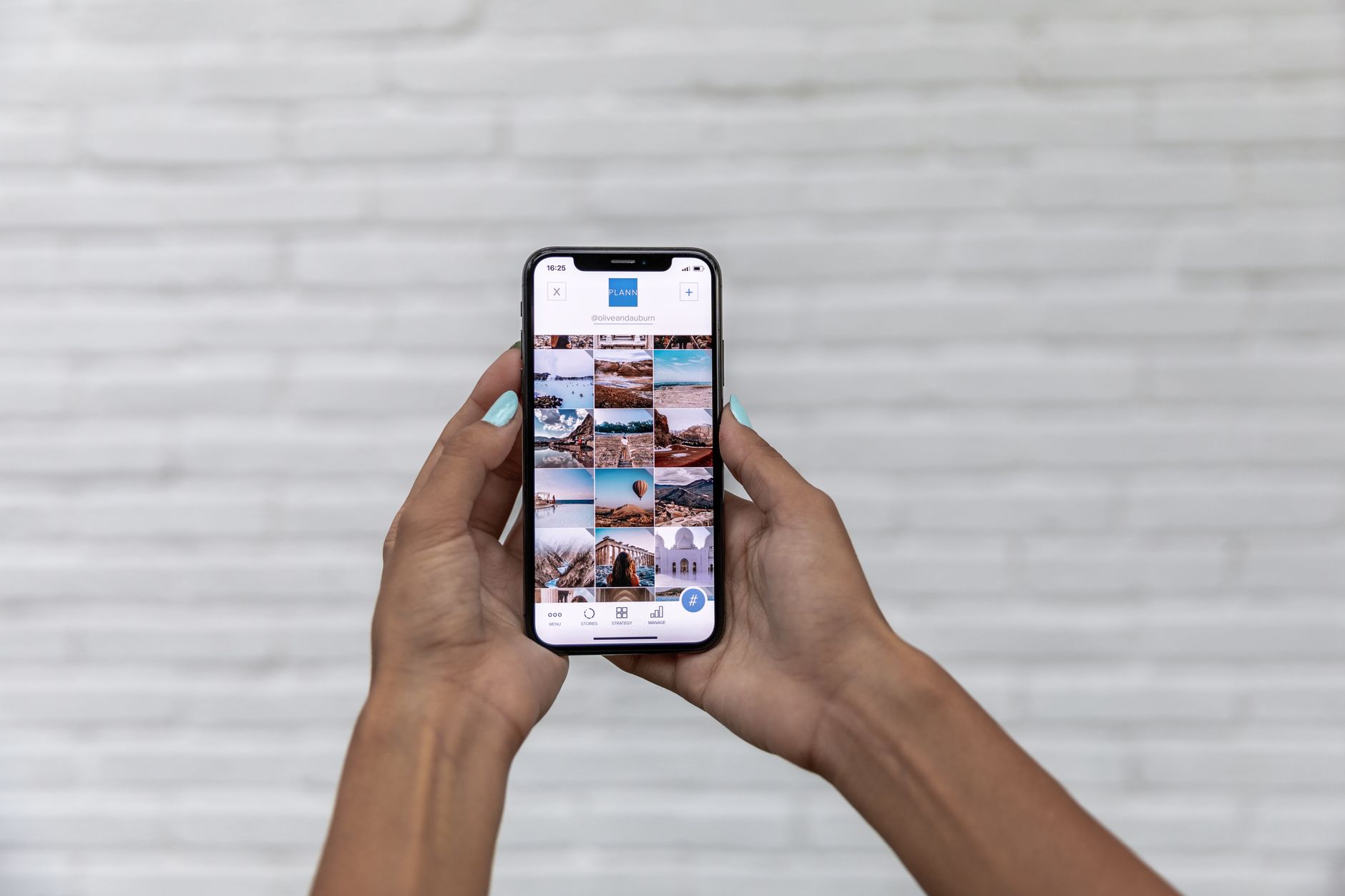 A person browsing a photo gallery on a smartphone