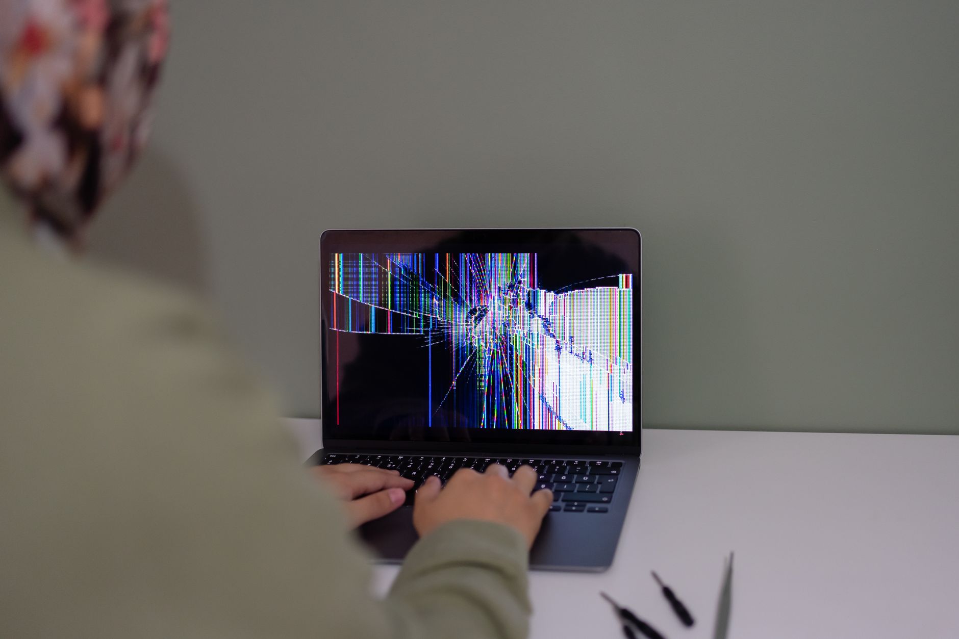 A laptop screen showing a terminal or boot interface
