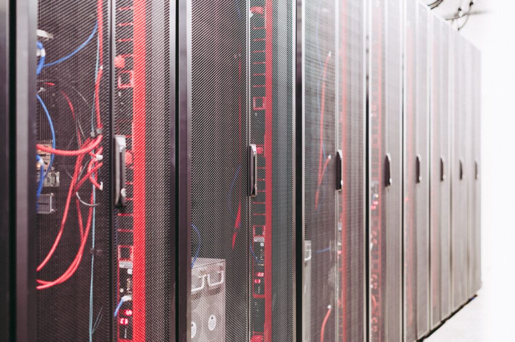 A rack of servers in a data center representing self-hosted infrastructure monitoring