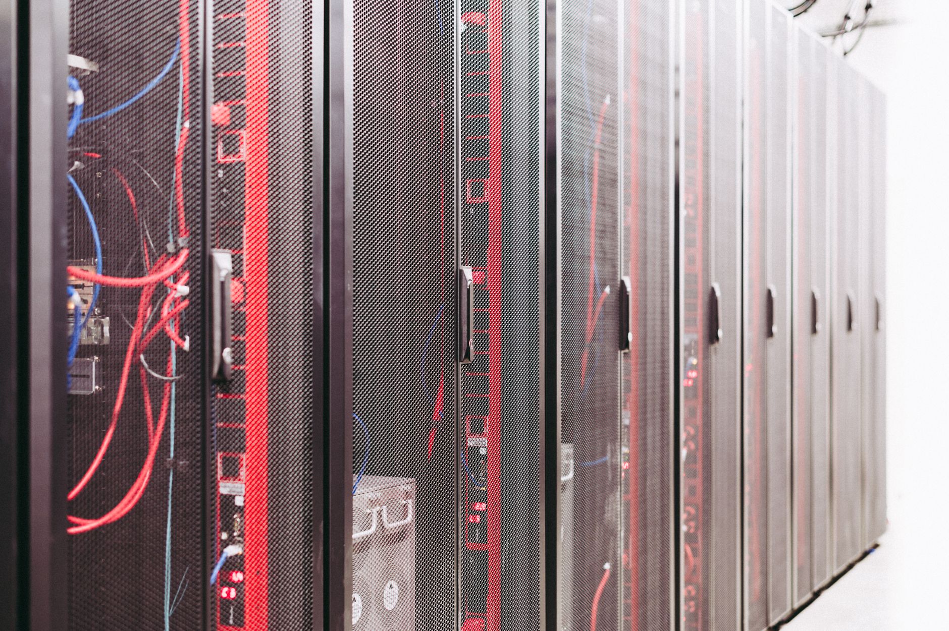 Server rack in a data center representing self-hosted infrastructure