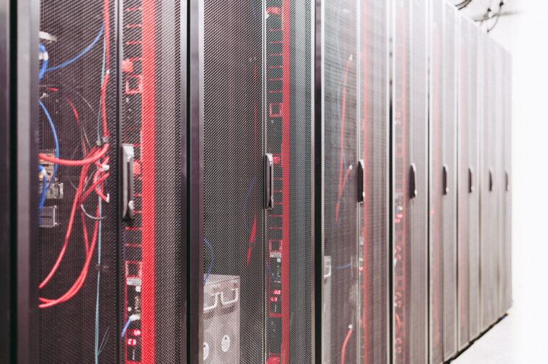 Set Up Vaultwarden as a Self-Hosted Bitwarden Password Manager A rack of servers in a data center representing self-hosted infrastructure
