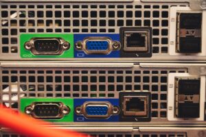 A home server setup with multiple drives and networking hardware on a desk