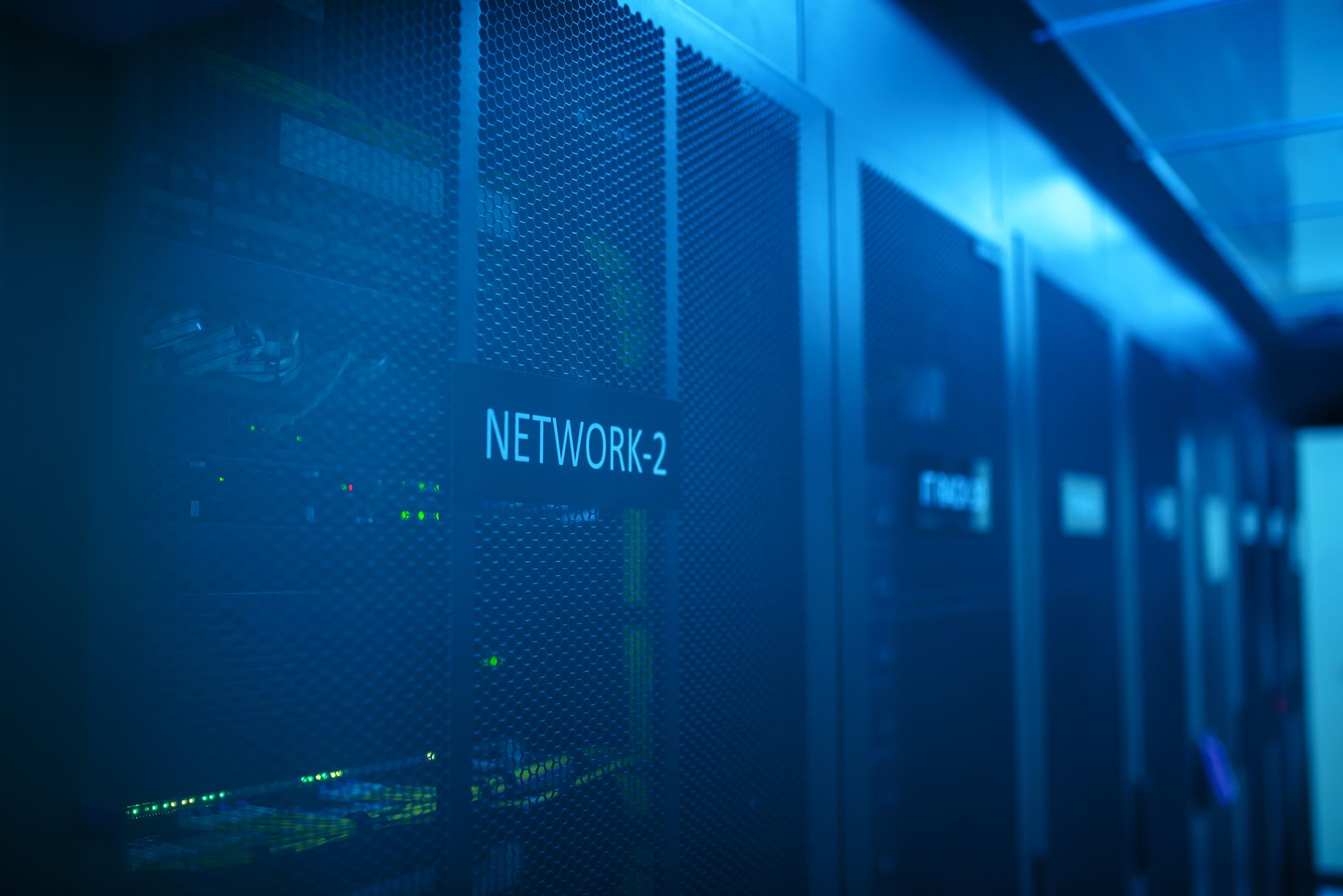 A web-based network management dashboard displayed on a monitor
