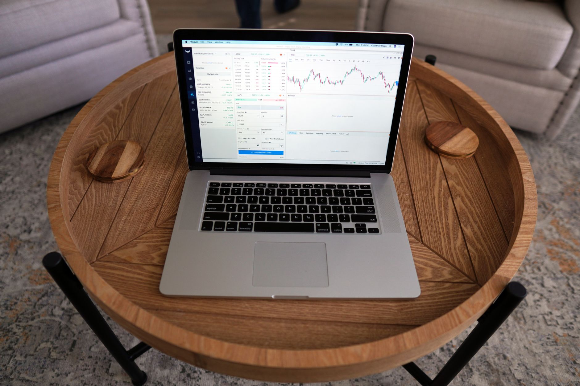 A laptop displaying a web-based dashboard interface for media management
