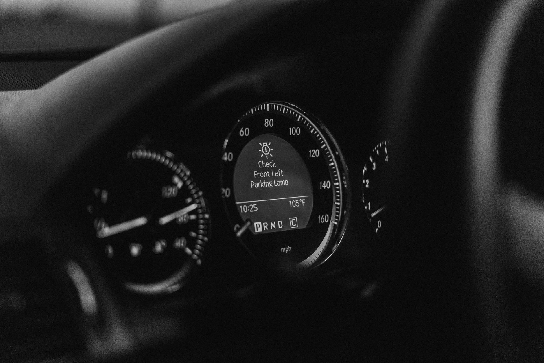 A computer monitor displaying a system performance dashboard with graphs