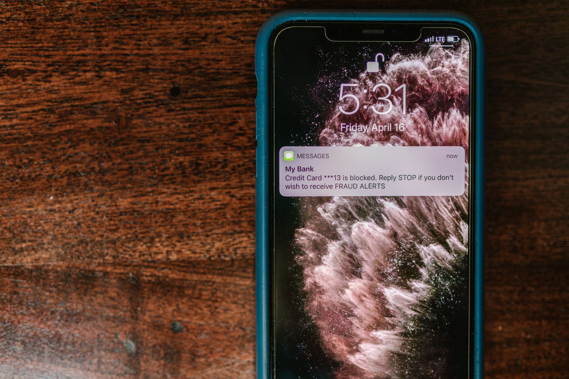 A smartphone showing an app notification alert for a webpage change