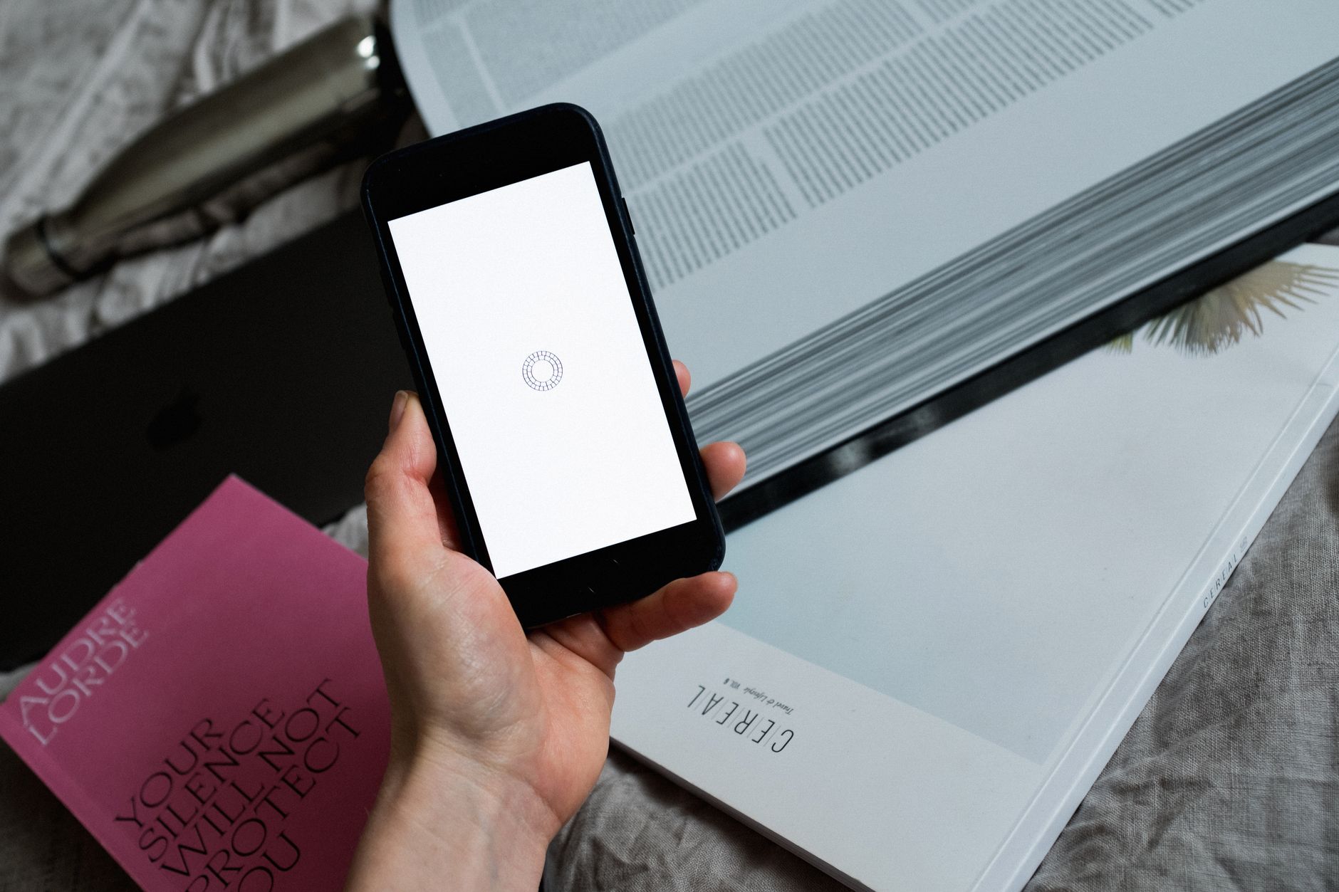 A person reading articles on a smartphone with a clean reading interface