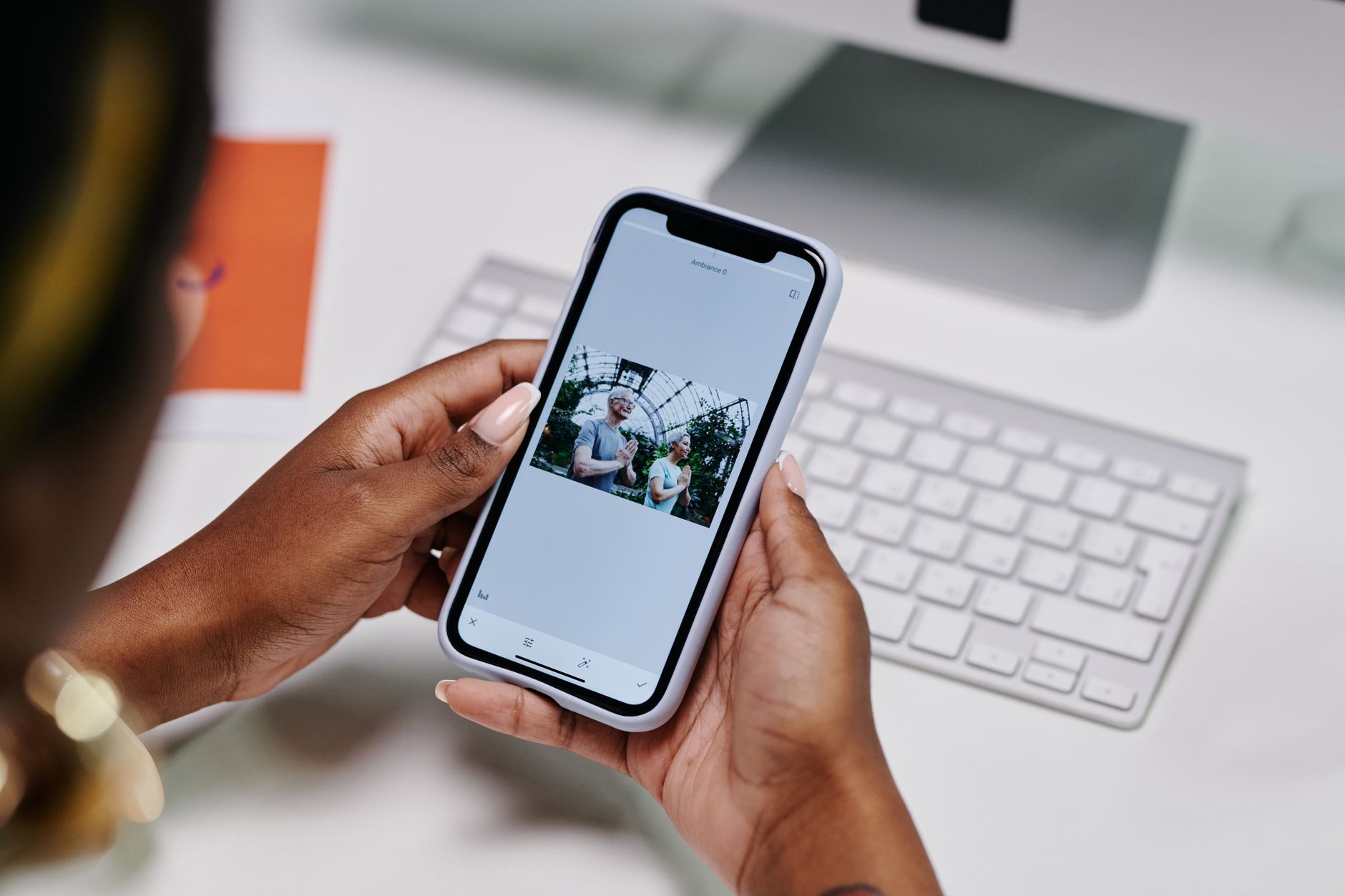 A person browsing a photo gallery on a smartphone screen