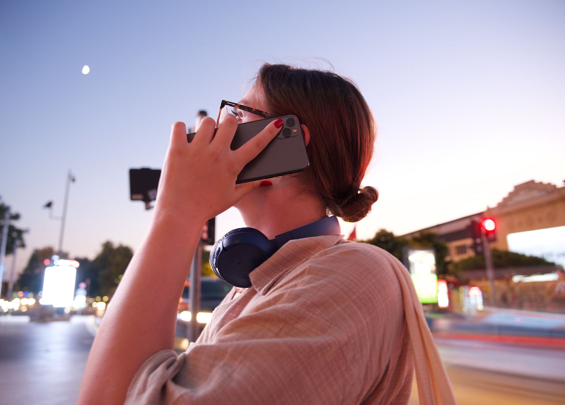A smartphone automatically backing up photos to a local home server over Wi-Fi