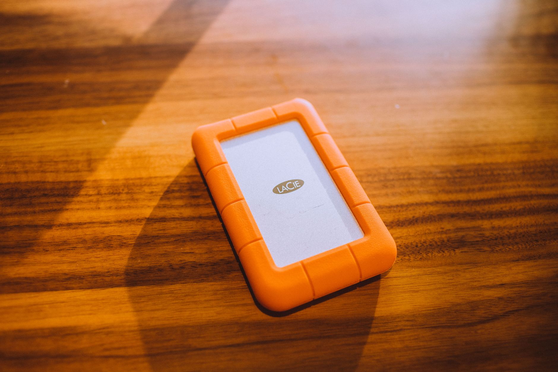 External hard drive connected to a laptop for data backup