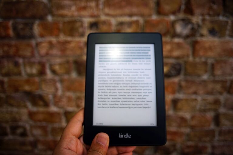 Digital ebook library displayed on a tablet screen with shelves of book covers