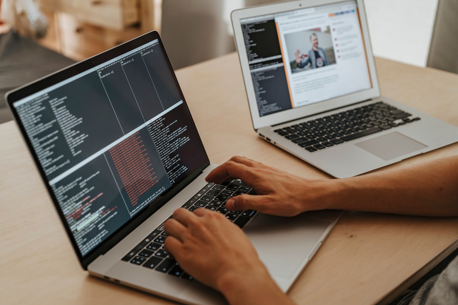 Developer working on a laptop managing application deployment configuration