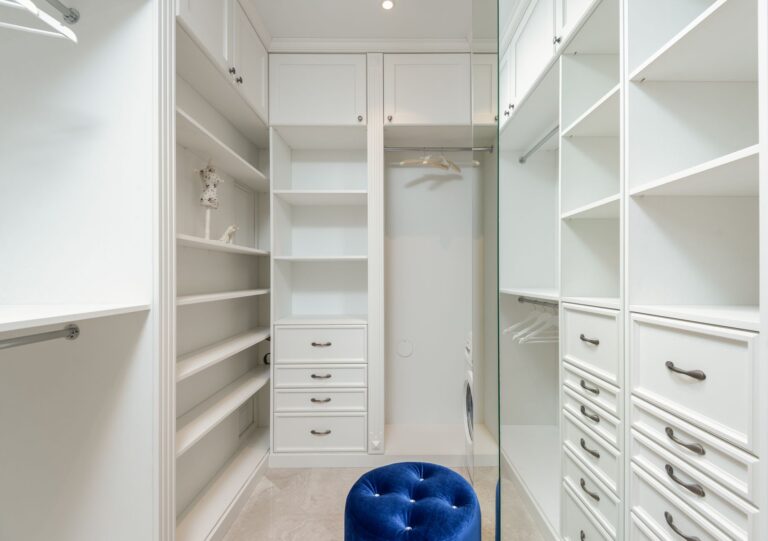 Set Up Homebox as a Self-Hosted Home Inventory Tracker Organized shelves and boxes in a tidy home storage room