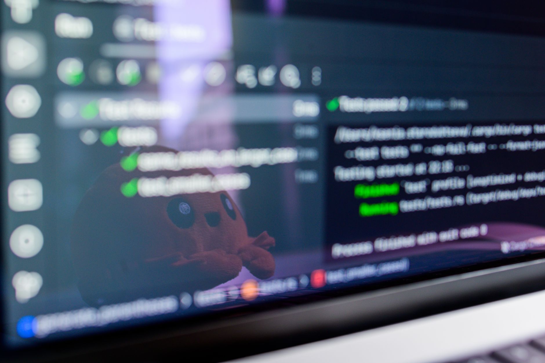 Computer monitor displaying code or terminal output for web monitoring setup