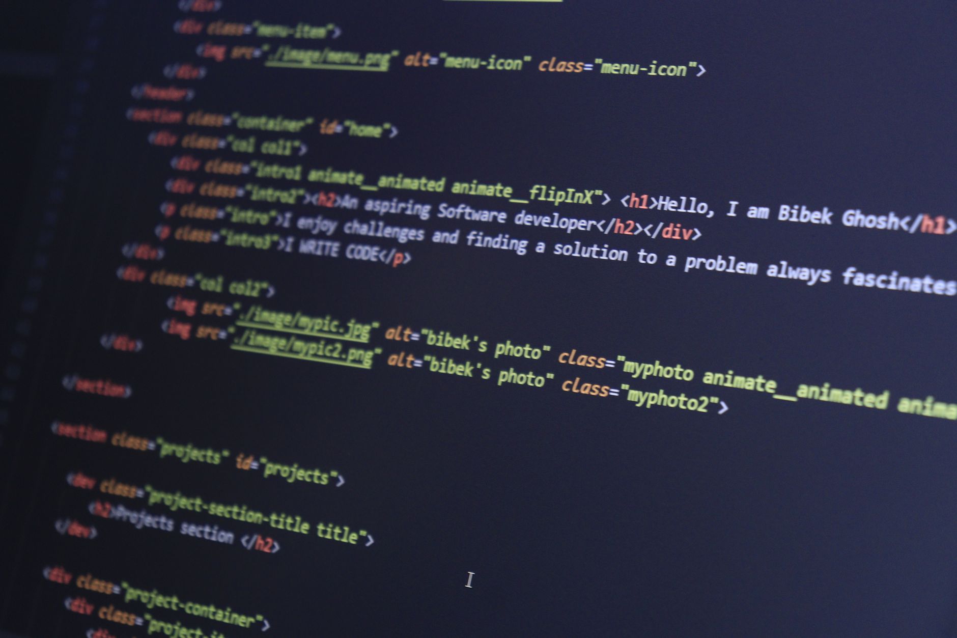 A text editor on screen showing structured configuration code in a dark theme