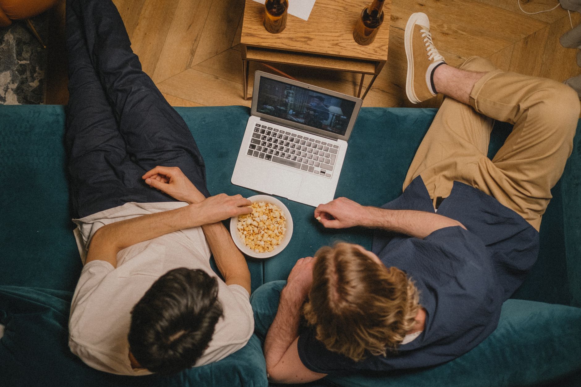 Person browsing a movie library on a large screen television