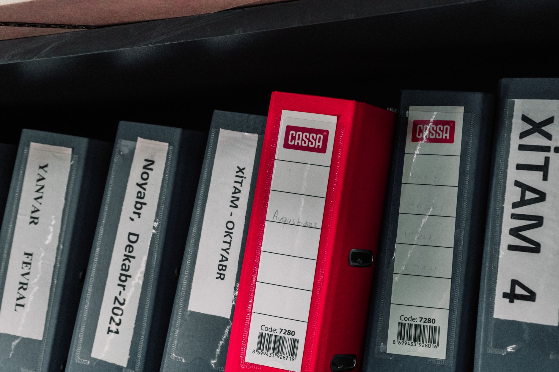 Neatly organized folders and documents in a filing cabinet